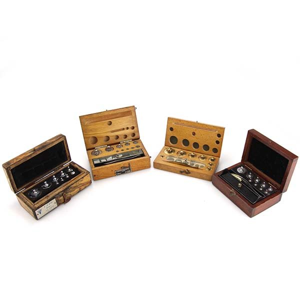 4 Sets of Cased Grain Weights.: 4 Sets of Cased Grain Weights. Including one Soviet set and one Hungarian set.