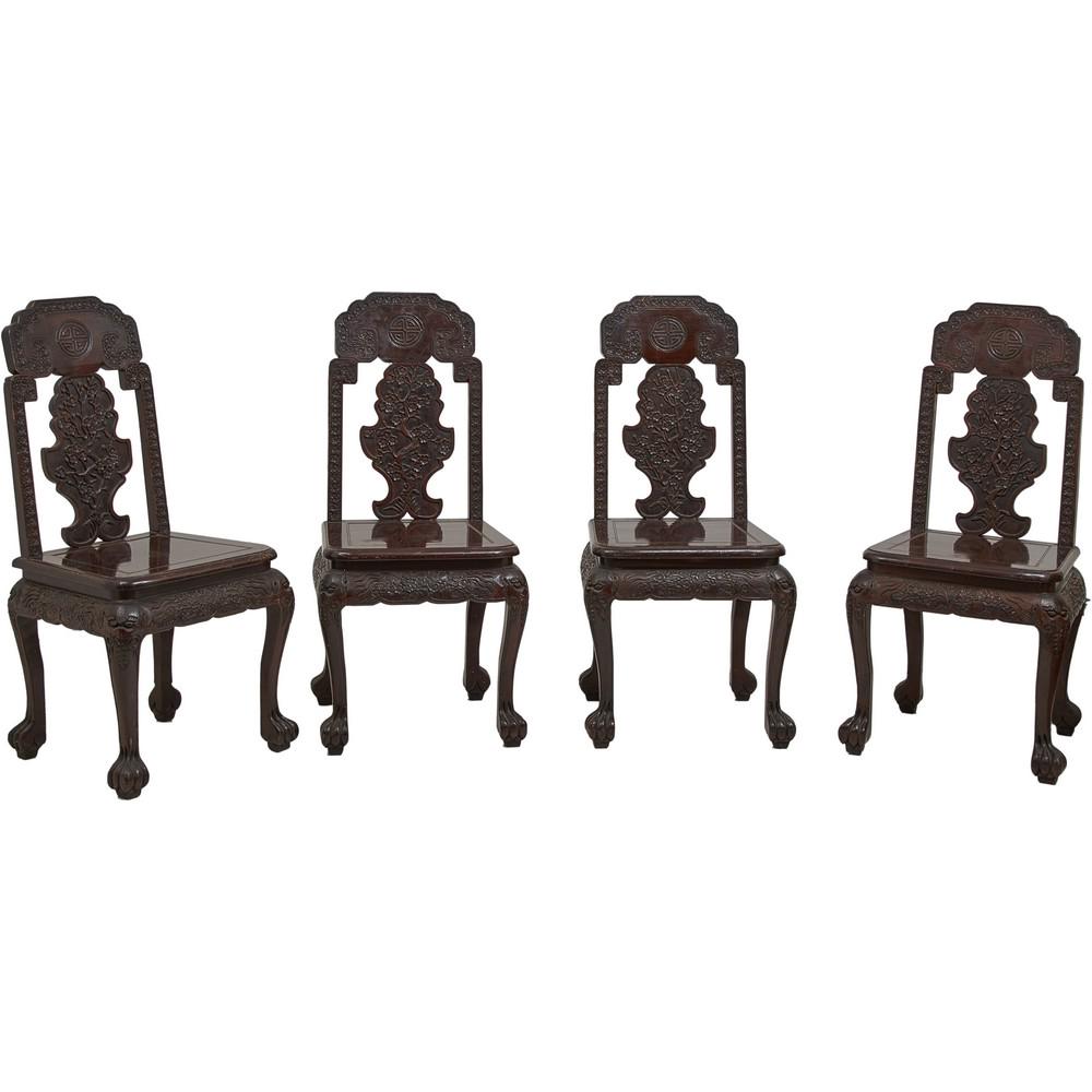 QUATTRO SEDIE in legno di palissandro: QUATTRO SEDIE in legno di palissandro riccamente intagliate. Cina fine '800. Alt. cm 100 Alt. seduta cm 47.