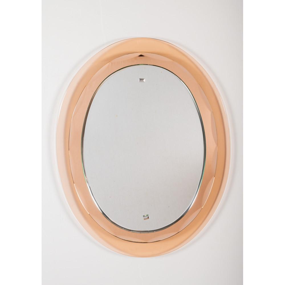 VECA, Specchio, applique e plafoniera: VECA Produzione Italia 1960 ca. Uno specchio da parete ovale, cristallo colorato molato nei toni rosa, cristallo molato specchiato, ottone cromato; una lampada da soffitto, corpo quadrato con struttur