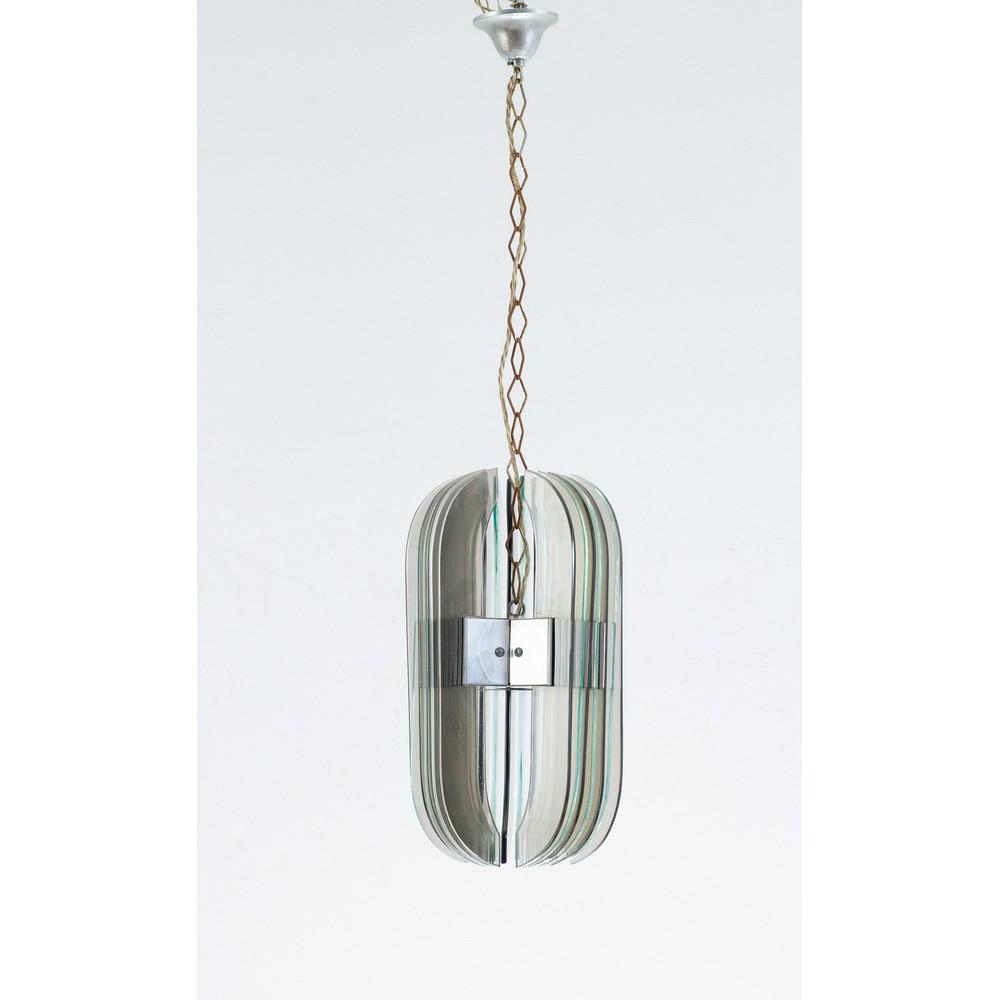 VECA (Attr.le), Lampada a sospensione: VECA (Attr.le) Produzione Italia 1970 ca. Lampada a sospensione ad una luce con struttura in metallo cromato, diffusore ovalizzato composto da lame di vetro trasparente e fumè. Cm Alt. 89. A SUSP