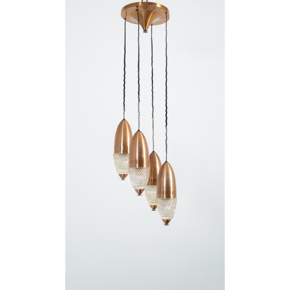 STILUX (Attr.le), Lampada a sospensione: STILUX (Attr.le) Produzione Italia 1960 ca. Lampada a sospensione a quattro luci, struttura in metallo brunito, diffusori ovalizzati in metallo e vetro trasparente a stampo. Graffi. cm Alt. 120.