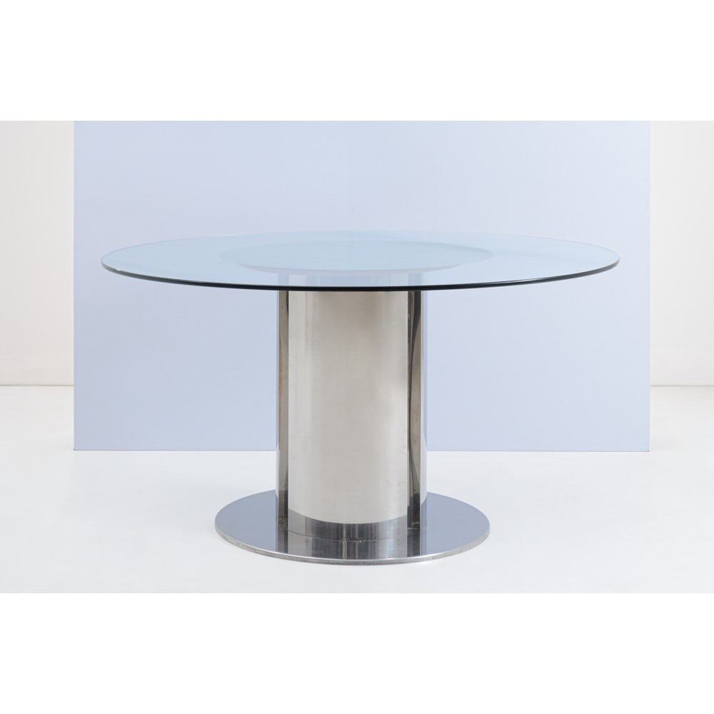 ANTONIA ASTORI, Tavolo da pranzo modello “Cidonio”: ANTONIA ASTORI Produzione Driade, Italia 1970 ca. Tavolo da pranzo modello “Cidonio” con struttura in acciaio cromato, piano circolare in cristallo trasparente. Segni d’uso. cm Ø