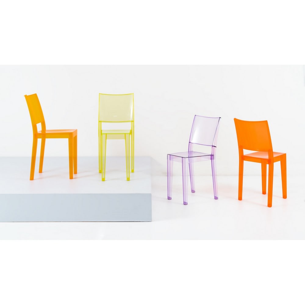 PHILIPPE STARCK, Quattro sedie modello “La Marie”: PHILIPPE STARCK Produzione Kartell, Italia 2000 ca. Quattro sedie modello “La Marie” in policarbonato trasparente colorato di diverso tono, arancione, giallo, viola e rosso. Segni di uso e