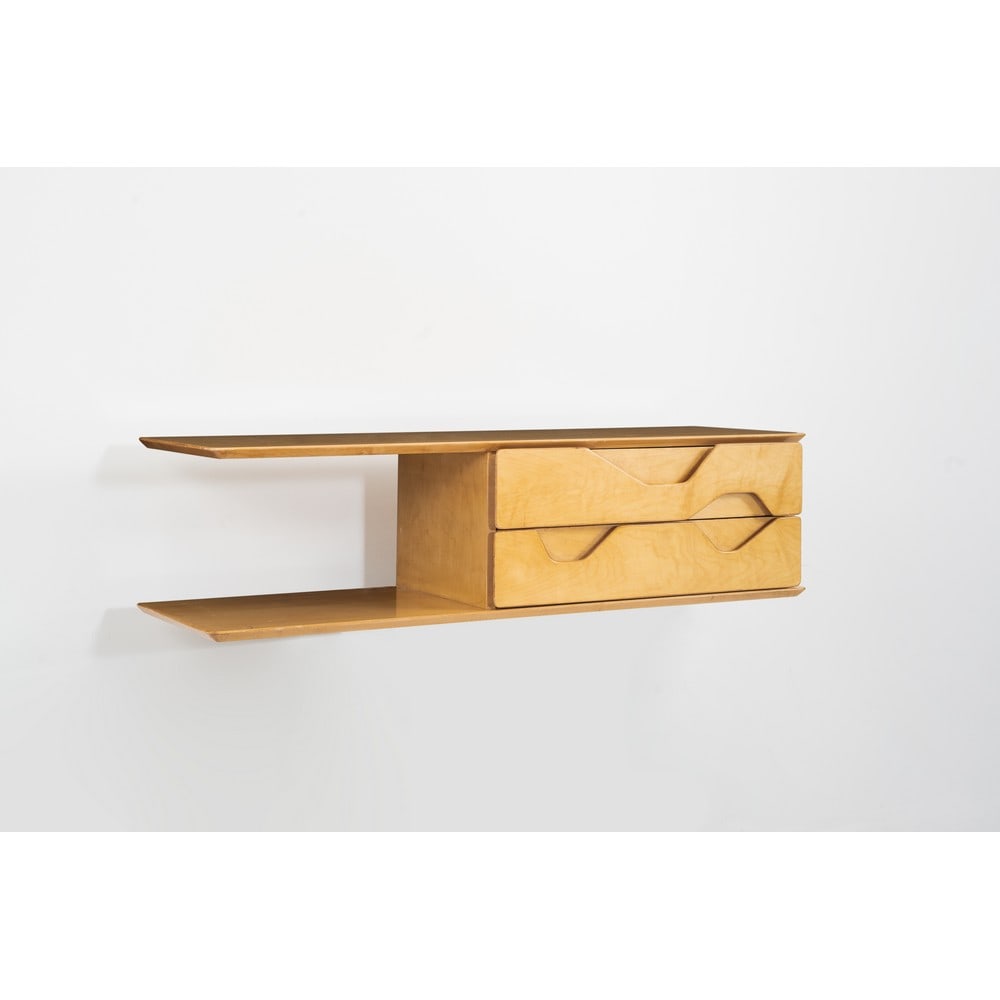 GIO PONTI, Cassettiera sospesa: GIO PONTI Produzione Giordano Chiesa, Italia 1950 ca. Cassettiera sospesa in legno di acero, sul fronte due cassetti con geometrie, piano e sotto piano aggettanti a mensola. Disegno originale per gli