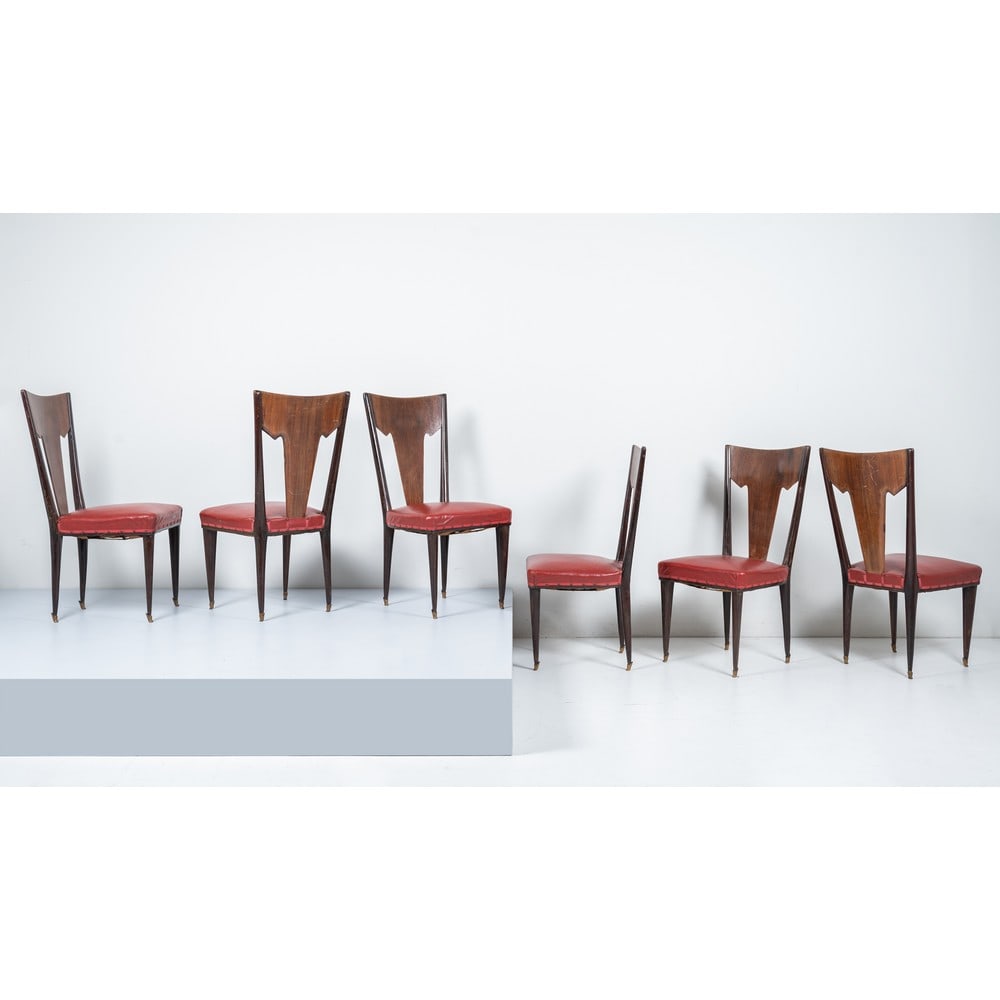 GIO PONTI ED EMILIO LANCIA (Attr.le), Sei sedie: GIO PONTI ED EMILIO LANCIA (Attr.le) Produzione Italia 1940 ca. Sei sedie con struttura in legno di noce, spalliera sagomata, seduta con imbottitura e rivestimento in skai bordeaux, gambe ebanizzate,