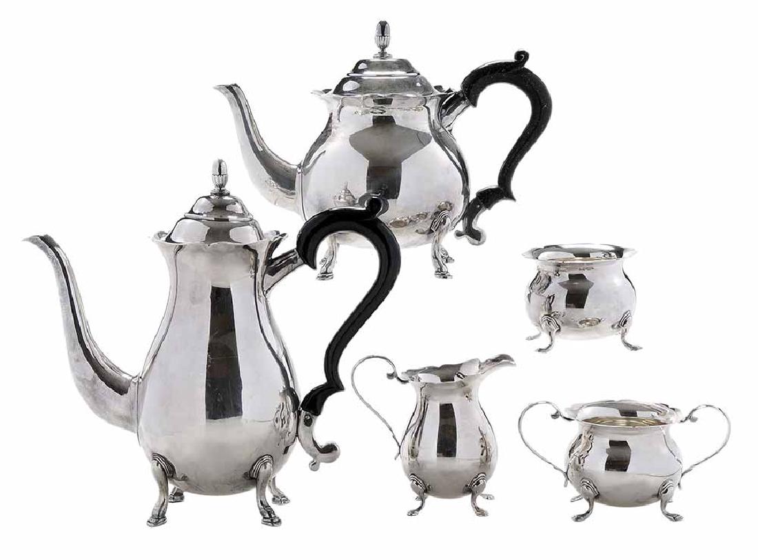 Japanese Five Piece Sterling Tea: Service 20th century, urn form, dome top with bud finial, painted black wooden handles, no makers mark, .950 fine, 55.65 oz. T., 9-3/4 in. coffee pot with matching teapot, creamer, open sugar and wast