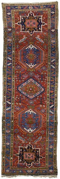 Heriz runner: Heriz runner, five central medallions on burgundy field, blue and olive borders, 3 ft. 2 in. x 10 ft. Generally even medium pile, no threadbare areas found.