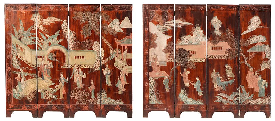 Pair of Chinese Laquered Floor Screens: Chinese, late 19th/early 20th century, two four section panels, front side painted with a walled garden scene of women at leisure, reverse side carved and painted landscape depicting men in various st