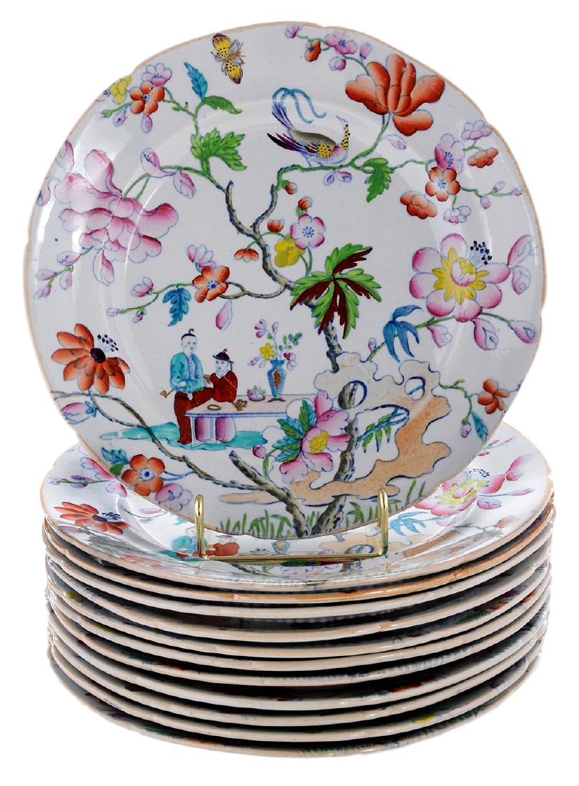 Twelve Mason's Ironstone Plates with Overall Pattern of: English, polychrome painted overall design printed in underglaze blue, light lustre on rim, 9-1/2 in.,. Provenance: Property from the Collection of Marjorie S. Fisher, Palm Beach, Florida