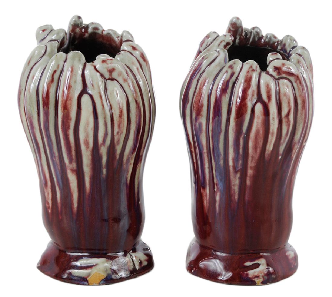 Pair French Art Deco Sang De Boeuf Flambe Vases: French, early 20th century, in the style of Dalpayrat, pair of molded coil form cabinet vases, hand finished, with sang de boeuf flambe glaze, unsigned, 8-3/4 in.. Provenance: Property from the Collec