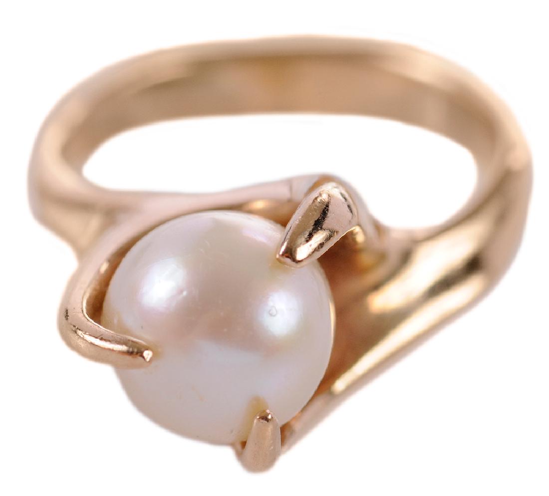 Ed Wiener 14kt. Pearl Ring: with one cultured pearl approx. 8.5mm, stamped "EW, 14K", size 6, 6.7 grams, with copy of original receipt. Provenance: Private Collection, Nashville, Tennessee