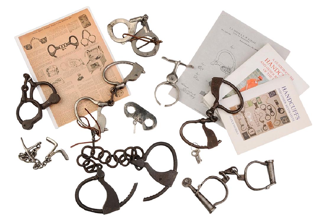 Iron, Steel Handcuffs and Leg Irons: American and Continental, 19th/20th century, pair iron Tower's Double Lock leg shackles, 20 in., [no key]; two pair iron hand cuffs, one Tower Double Lock with keys, 9-3/4 in., [surface rust, nicks];