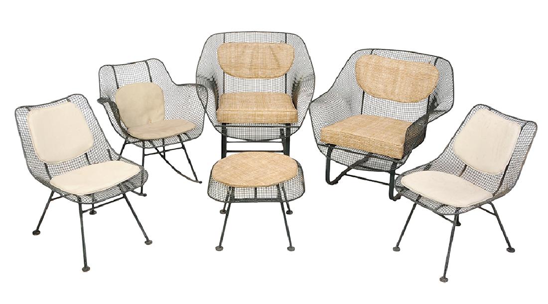 Mid-Century Modern Green Painted Wirework Patio Set: c. 1950s, in the style of Harry Bertoia, comprising two armchairs with spring supports, two side chairs, rocking chair and a stool, all with upholstered seat and back cushions, apparently unmarked, 31