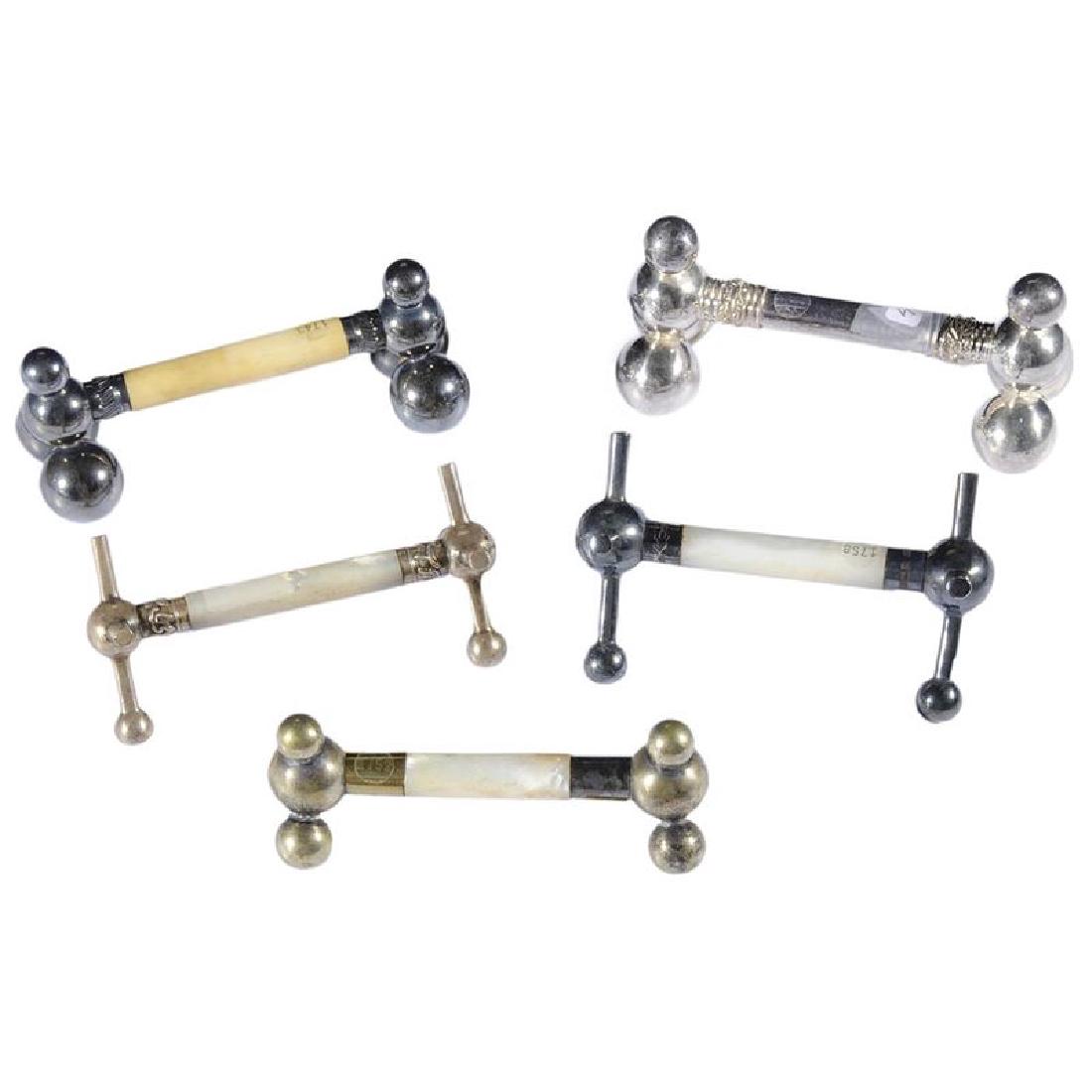 Group of Twelve Silver and Silver-Plated Knife Rests (1 of 2)