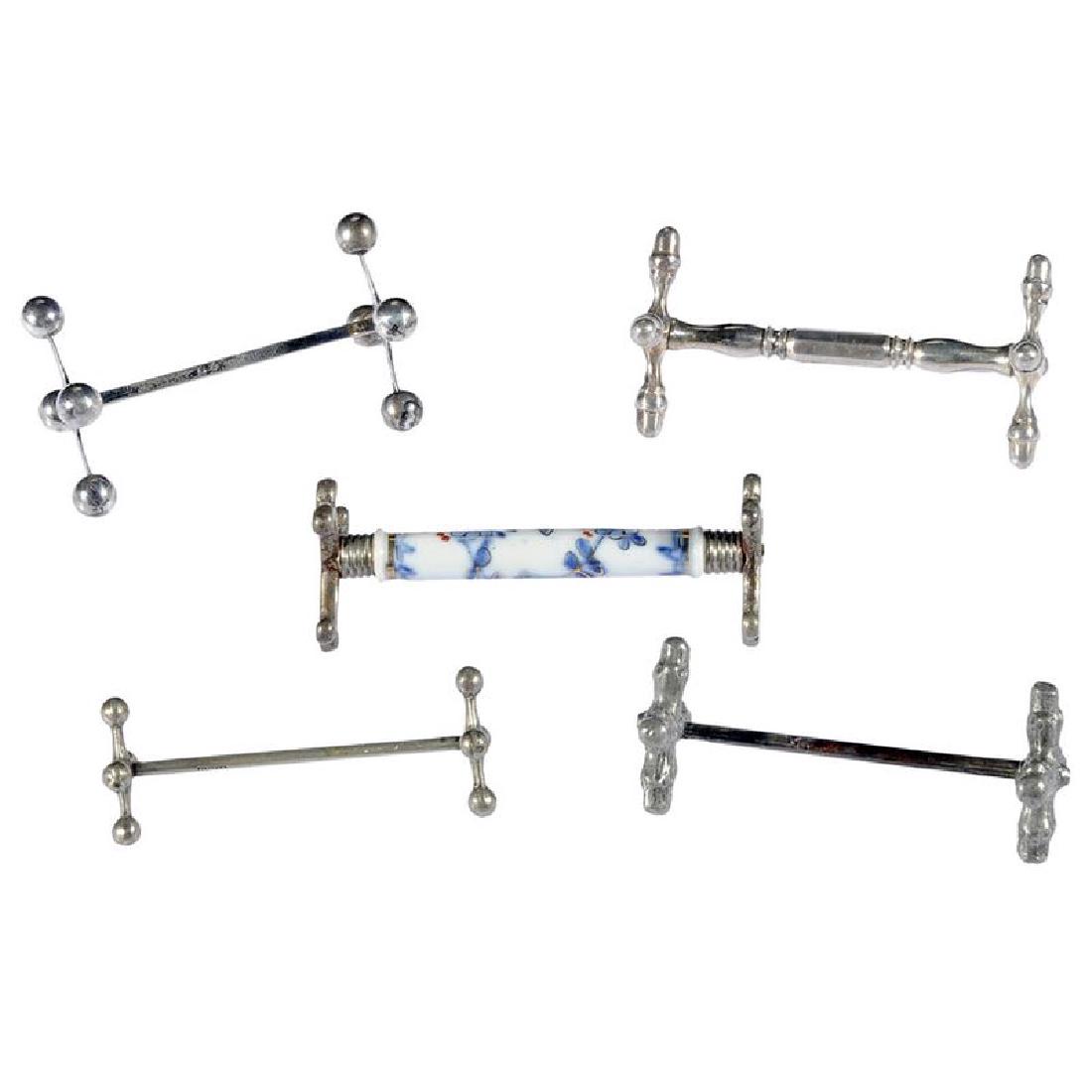 Group of 20 Silver and Silver-Plate Knife Rests (1 of 2)