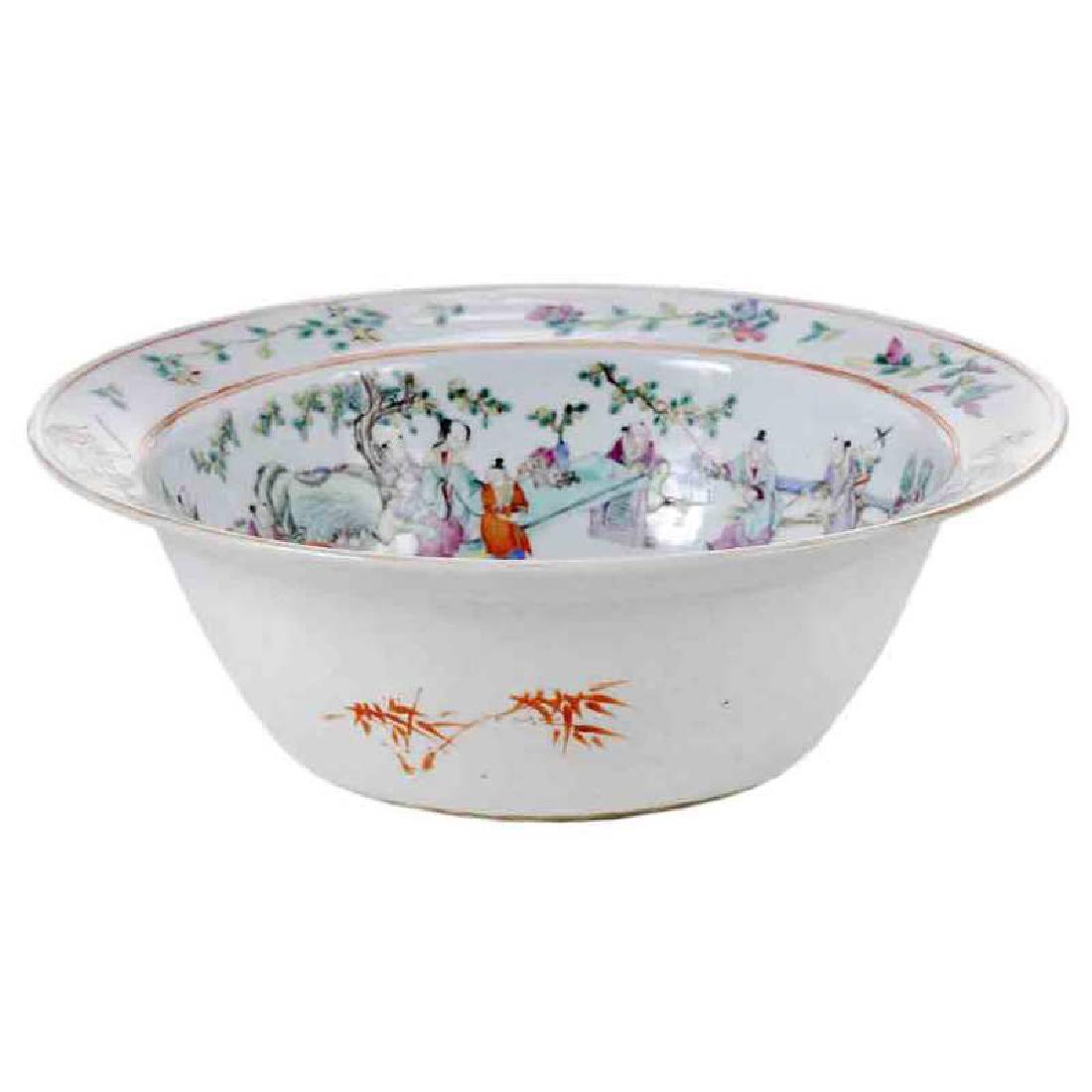 Chinese Famille Rose Bowl: 19th century, flanged rim bowl with polychrome enamel and gilt decoration of figures in a landscape, central image of Guanyin, riding the back of a dragon and holding two children, rim decorated with 