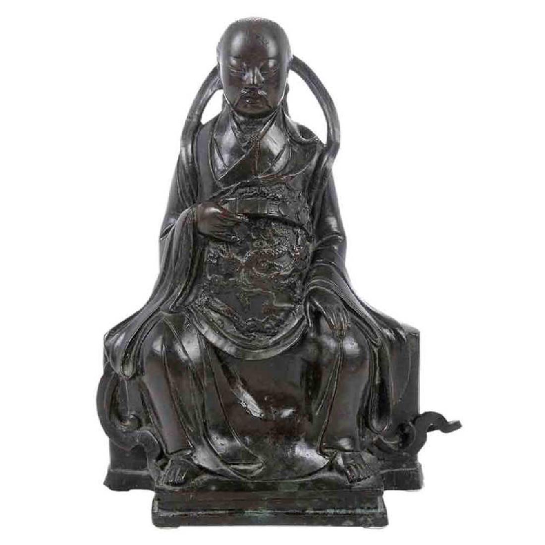 Bronze Figure of a Seated Emperor: Chinese, 19th century or earlier, seated on a throne, dressed in elaborate robes, wearing a dragon badge and belt, 12-1/2 in.