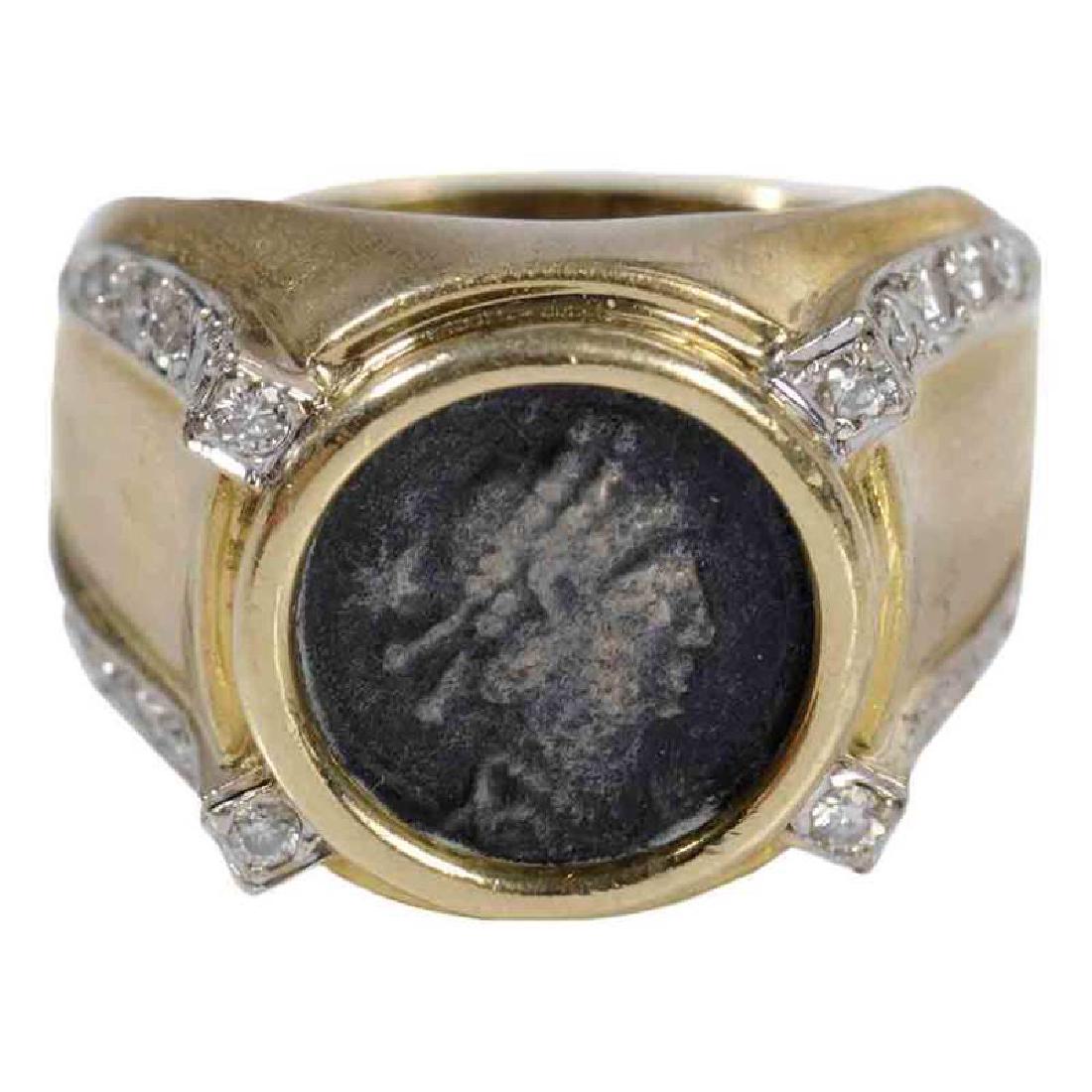 18kt. Diamond Coin Ring: matte finish, 24 round brilliant diamonds estimated total weight 0.48 carat, coin or medallion in center, stamped "750", yellow gold, size 6-1/4, 10.9 grams
