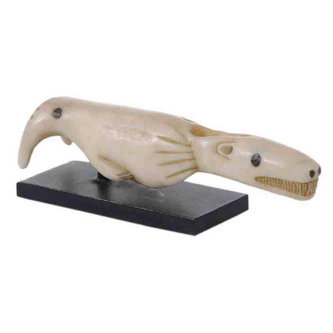 Inuit Carved Bone Figure: 19th century, depicting a walrus and a seal, inset eyes and nostrils, carved body elements throughout, 3-3/4 in. Probably Mathias Komor, New York, New York, circa 1960s or 1970s; A signed statement fr