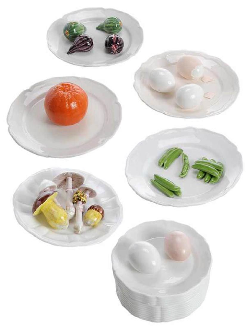 Six Este Ceramic Articles for Tiffany & Co.: Italian, 20th century, ceramic decorative plates and jar with colorfully attached glazed comestibles, marks "Este/Made in Italy/For Tiffany Co.", fig plate, 8 in.; hard boiled egg plate, 7-3/4 in.; mu