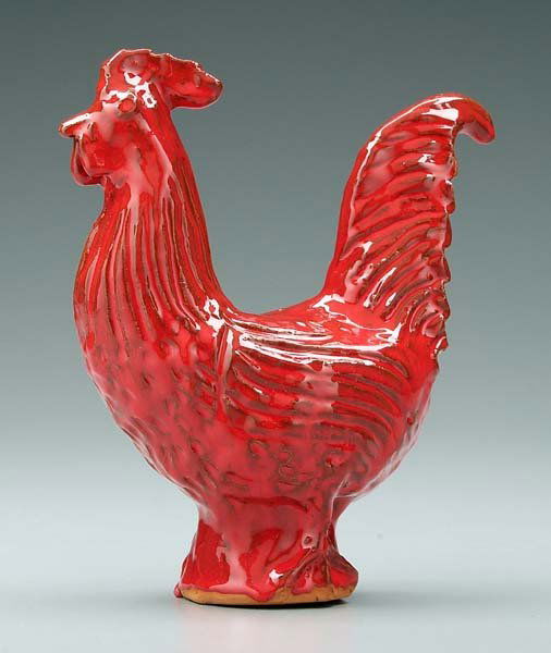 Charles Moore stoneware rooster,: incised feather detail, glossy red glaze, incised on bottom, "Charles Moore" (Seagrove, North Carolina) and possible date, 8-1/2 in.