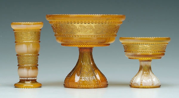 Three pieces holly amber glass