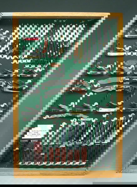 Store display of Case knives,: Store display of Case knives, 40 varieties of Case knives (W. R. Case & Sons Cutlery Co., Bradford, Pennsylvania), complete sample set in original wood and Plexiglas display case: 29 folding, single a