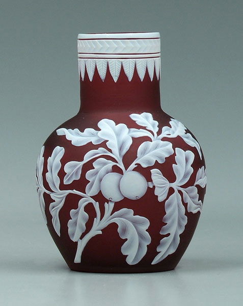 Cameo glass vase,: Cameo glass vase, white floral and fruit decoration on dark red ground, attributed to Thomas Webb & Sons, England, 1885-1925, 4-1/2 in. Provenance: Agnes Koehn, Cedar Rapids, Iowa, 1967.