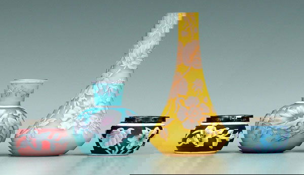 Four miniature cameo glass vases: Four miniature cameo glass vases: one white and pink on yellow ground, 3-7/8 in., [possibly reduced, very small rim chips]; one white and pink on blue ground, attributed to Thomas Webb and Sons, 2 in.