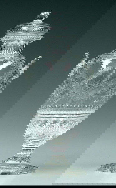 Intaglio cut glass lidded urn,: Intaglio cut glass lidded urn, fine cut swags with parrots, octagonal base, signed on side, "W. Fritsche" (worked for Thomas Webb & Sons), 10-1/4 in. Top of finial possibly ground. Provenance: Maude B