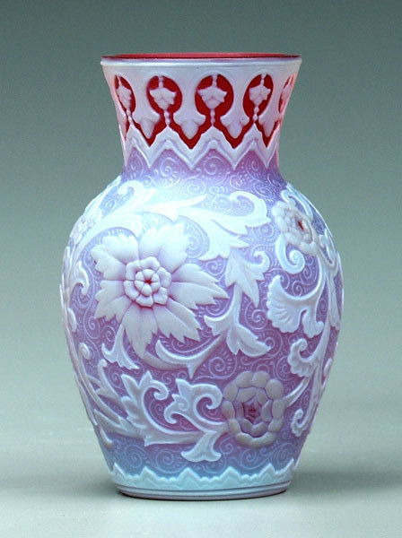 Cameo glass vase,: Cameo glass vase, floral and scroll decoration below arabesque rim, opalescent white on red ground, possibly Thomas Webb & Sons, England, 1885-1925, 4-1/2 in. Tiny (1/32 in or less) chips at rim and e