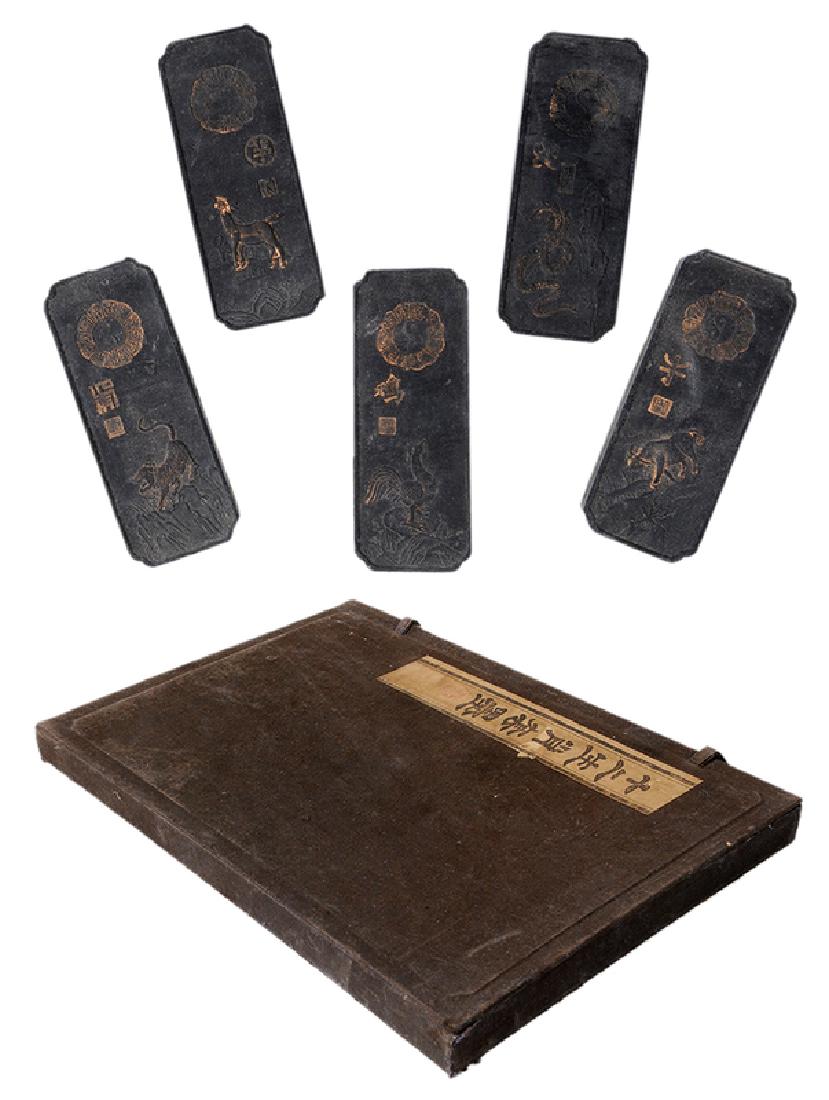 Set Ink Stones - Zodiac: Chinese, early 20th century, set of carved stones, each with a gilt scene depicting the zodiac figures, Chinese characters on reverse, fitted box 3-1/8 in. each