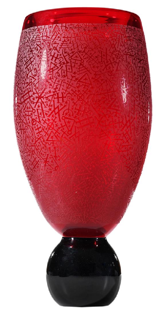 Duncan McClellan: (American, born 1955) signed "Duncan McClellan", large baluster form vase with black ball base, blown and sandblasted red ground, etched band of symbols, 20 in.
