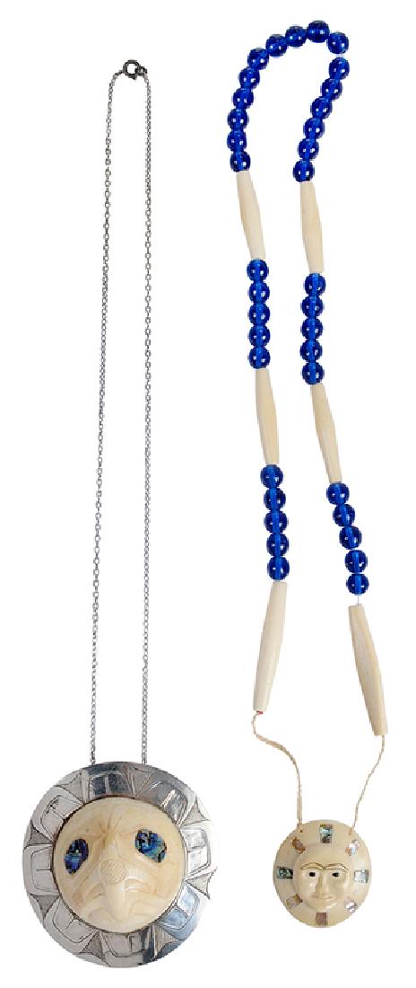 Two Northwestern Bone Necklaces: One Duane Pasco pendant, carved bone bird with inlaid abalone, mounting tested sterling silver, hand engraved "D. Pasco, 74", on chain stamped "sterling", 3 x 3 in., 23-1/2 in. lg., 77.3 grams, spot