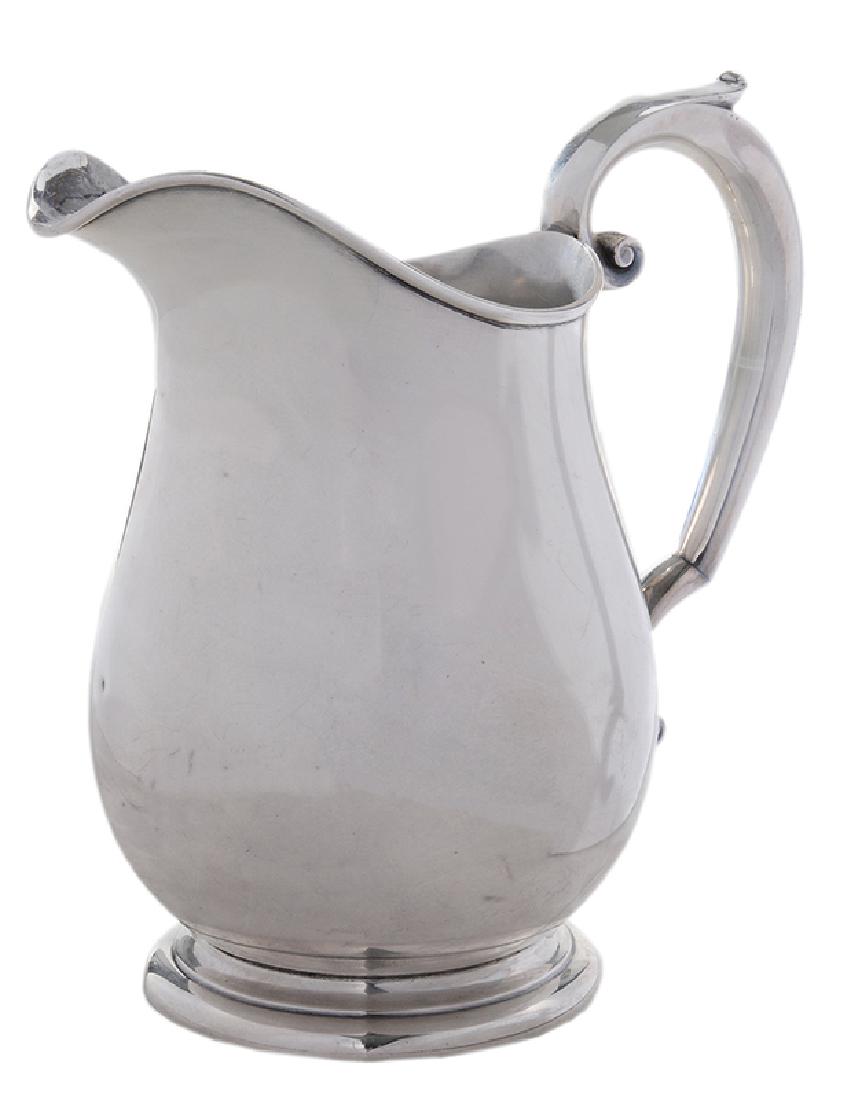 Sterling Water Pitcher: American, 20th century, helmet form, scroll handle, ring base, monogram on base “From Ma Ma/6.22.56”, marks for Watson Co., “U7”, 19.72 oz. T., 8-3/4 in.