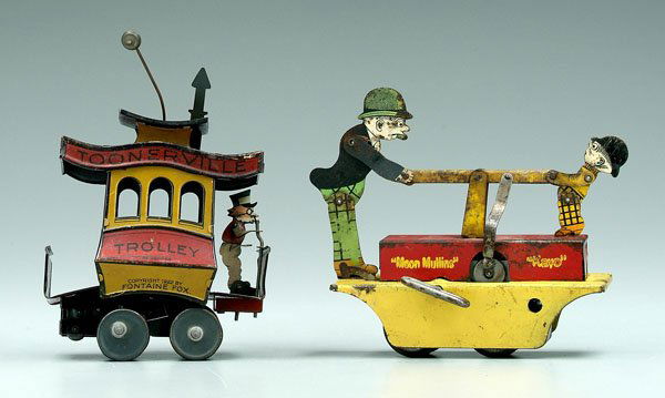 Two wind-up toys: "Moon Mullins" and "Kayo", hand car made to be run on track, good working order, 6-3/4 in., [original paint with minor chips, corrosion, some bent elements]; "Toonerville Trolley" with driver, marked