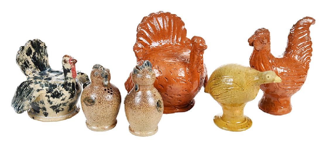Six Seagrove Pottery Bird Figures: North Carolina, four signed by Charles Moore (1935-2007) including a spotted turkey, 4 -1/2 in.; guinea hen, 3-1/2 in.; orange glazed rooster, 5-1/2 in.; and orange glazed turkey, 5 in.; with two ston