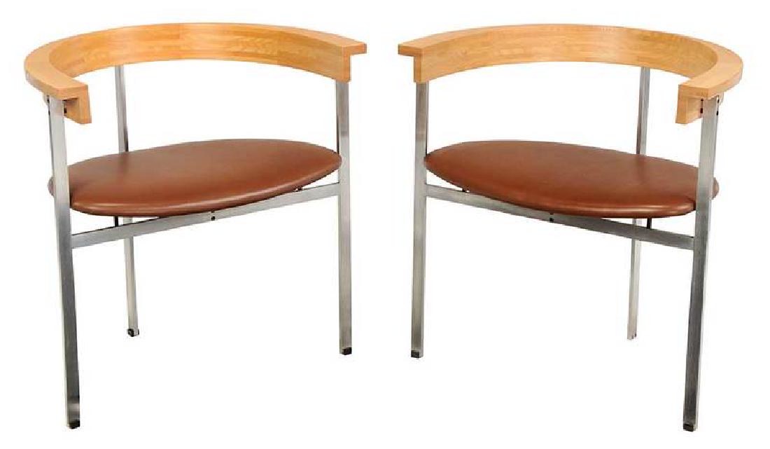 Pair of Paul Kjaerholm Dining Chairs: designed 1957, label for Fritz Hansen, Denmark, 1986, model PK-11, each with laminate ash back, original brown leather seat, brushed steel frame, 27-1/2 in. Note: The consignor purchased this fu