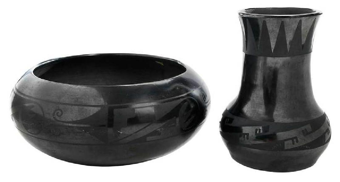 Two Maria Martinez Blackware Pots: Maria Martinez (1887-1980), San Ildefonso Pueblo, New Mexico, one bowl with decorative band, signed "Maria" on bottom, 4-1/2 x 10 in., minor scattered abrasions especially to base; vase with decoratio