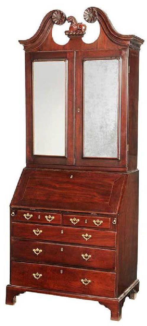 Irish George II Mahogany Secretary:  British, mid 18th century, mirrored doors, broken arch pediment, dog figural cartouche, pierced brasses, 92 x 39 x 23 in.