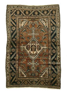 Hamadan rug,: serrated central medallion on brown field, pale salmon, dark blue and brown elements, areas of wear, pile varies from none to low, some corrosion of brown and green, some selvedge wear and breaks,