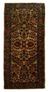 Sarouk rug,: repeating floral designs on an ivory field, red and blue borders, some curling of selvedge, generally even medium pile, some grime, 4'1" x 1'11"