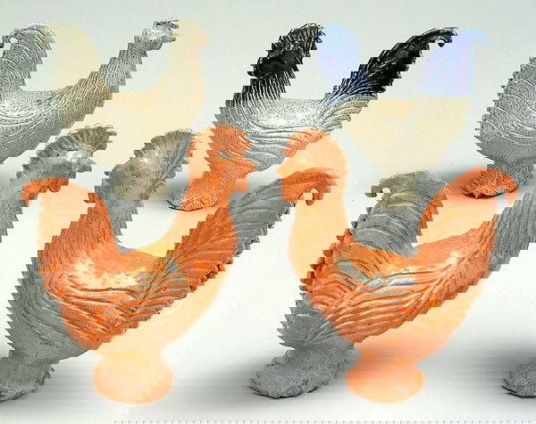 Four Charles Moore roosters: two salt glazed, one with blue highlights, 8"; two with orange glaze, 8-3/4", all marked "Jugtown Ware, Charles Moore", one dated 1986, three 1995