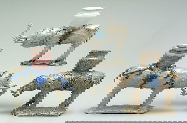 Three Charles Moore elephants,: jars on backs, impressed marks for Jugtown, dated 1993, one with "12", each approximately 6-1/2 x 10 x 4"