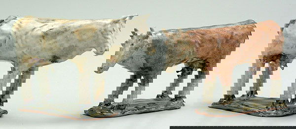 Two Charles Moore cows: both stamped "Jugtown Ware 1993", each approximately 5 x 8 x 2-1/2"