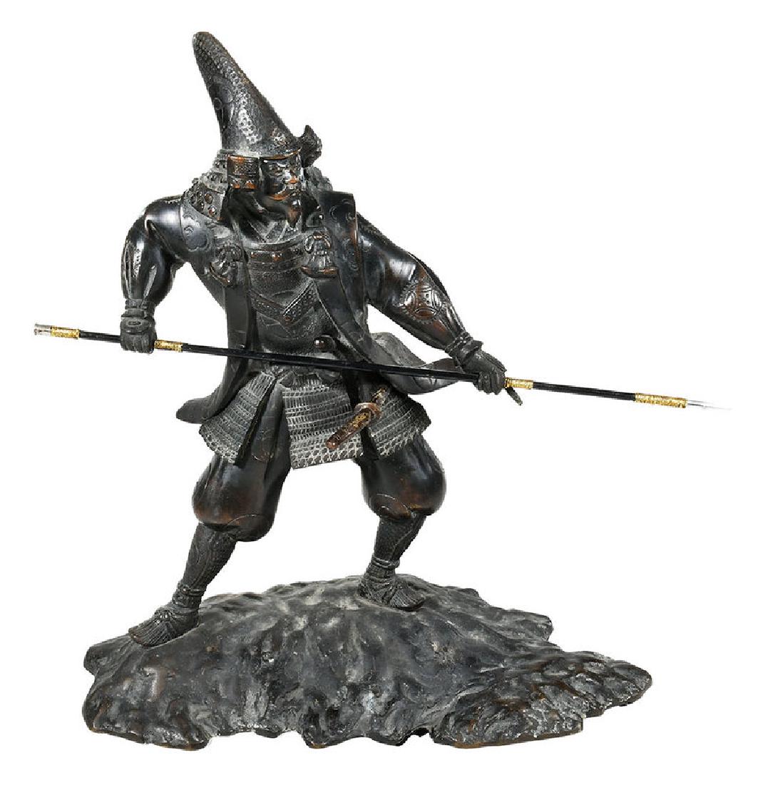 Japanese Bronze Samurai: Showa period, samurai in spearing position, with removable sword, marked at base, 14 x 14 x 6-1/2 in.