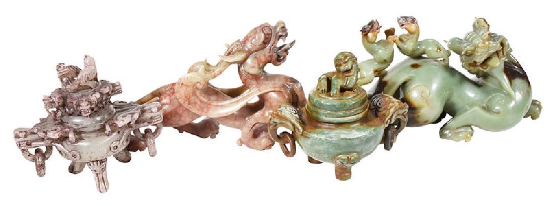 Four Chinese Carved Hardstone Decorative Objects: Qing dynasty/modern, consisting of one green and brown carved dragon with two cats fighting at back, 5-1/2 x 10 x 4 in. [excellent condition with minimal wear]; one mythical beast with horns and red v