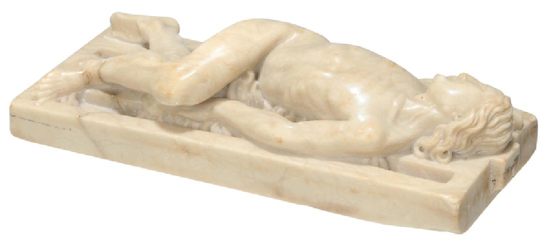 German or Italian School: (19th century or earlier) The Martyrdom of St. Lawrence, carved alabaster, 2-1/4 x 7-3/4 x 3 in., with Lucite case Provenance: From the Collection of Daniel Bibb, Atlanta, Georgia