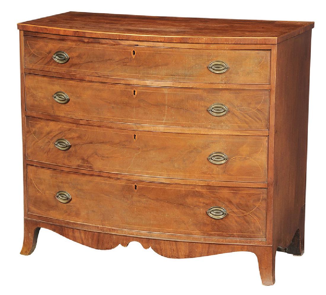 American Federal Inlaid Mahogany Bow Front Chest: middle Atlantic states, circa 1800, highly figured veneers, lined inlaid drawers with shield escutcheons, original brasses. 36-1/2 x 41 x 21-1/4 in.