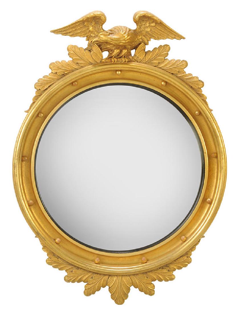 Federal Style Parcel-Gilt Convex Mirror: American, 20th century, with eagle and acanthus decoration, label verso for "D. Milch & Son Inc.", 31 x 22-1/2 in.